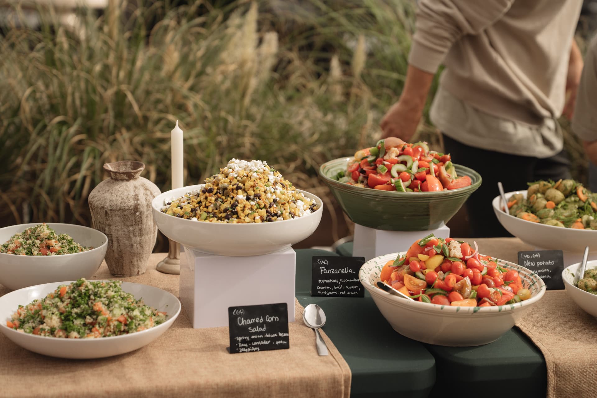 A spread of fresh salads laid out for lunch